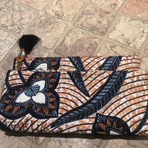 Beautiful tapestry clutch bag from Figue.
